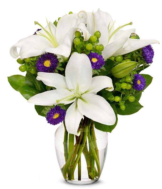 White lilies and purple aster bouquet