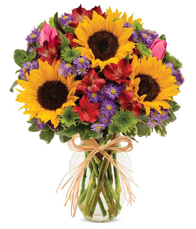 Sunflowers and pastel flowers for Mother's Day delivery