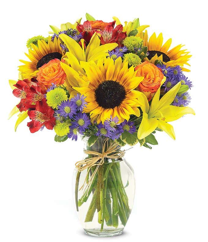 Sunflowers, yellow lilies and red alstroemeria