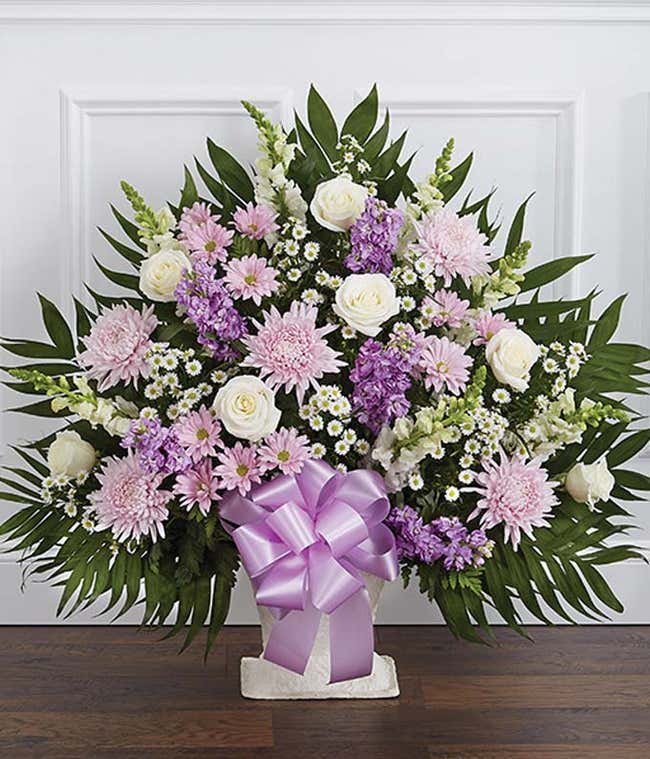 Purple and white flower sympathy basket