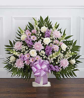 Purple and white flower sympathy basket